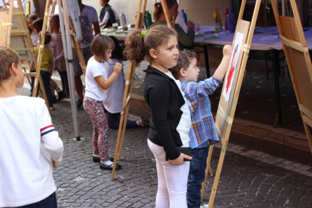 children painting, truffle festival Sant'Angelo in Vado, Le Marche, Italy
