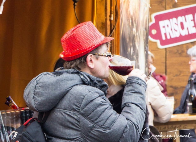 Enjoying a glass of wine on a Xmas market in Vienna/Austria